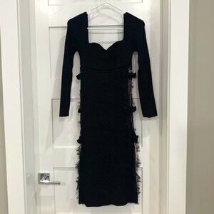 black dress with faux side cut and bows